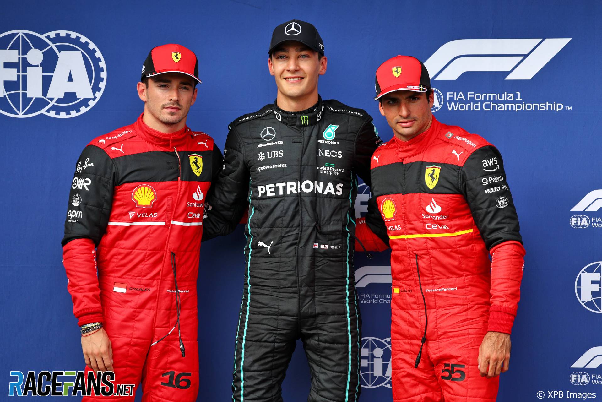The Top Three Qualifiers : Third Place Charles Leclerc (Scuderia Ferrari), Pole Position George Russell (Mercedes AMG F1 Team) and Second Place Carlos Sainz Jr. (Scuderia Ferrari)